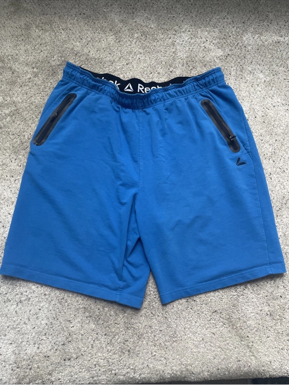 Reebok Men’s Royal Blue Athletic Shorts with Black zipper pockets XL